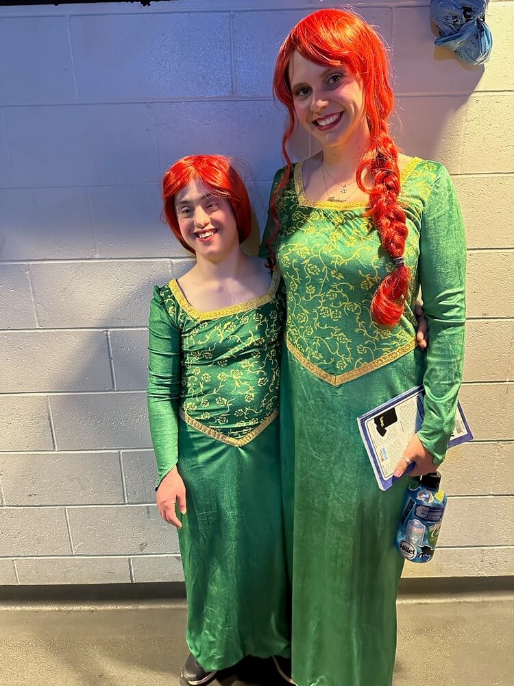 Rita and Sydney in Fiona costumes. Rita and staff member Sydney posing together in Fiona costume.