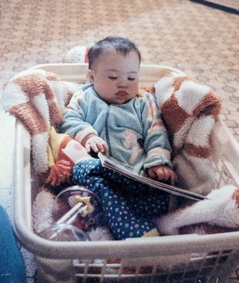 Rita in a laundry basket. Rita in a laundry basket.